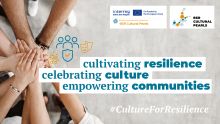 zdjęcie ludzkich dłoni, ułożnych na sobie jedna na drugą, napis "cultivating resilience, celebrating culture, empowering communities"