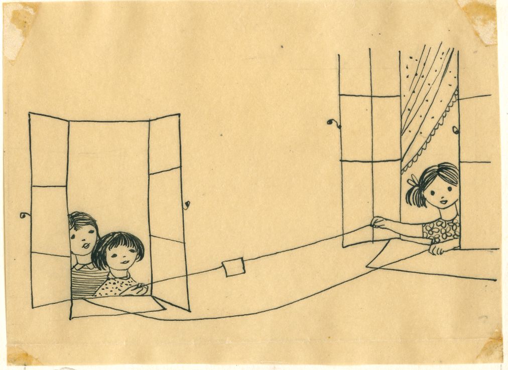 Dzieci przeciągają list za pomocą sznurka rozciągniętego między oknami. 